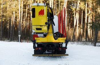 Сортиментовоз МАЗ-631228 с манипулятором Marchesi M10RS02.100 и кабиной оператора