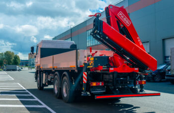 Бортовой автомобиль МАЗ AGС64М с КМУ Fassi F215A.0.23