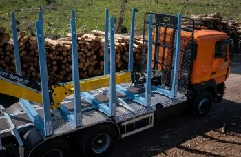 Сортиментовоз МАЗ 63128 с гидроманипулятором Marchesi M10RS 02.100
