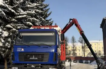 Сортиментовоз AGW64 M на базе МАЗ 630228 с гидроманипулятором TajfunBel L100K89