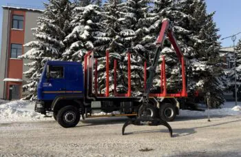 Сортиментовоз AGW64 M на базе МАЗ 630228 с гидроманипулятором TajfunBel L100K89