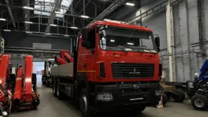 Бортовой автомобиль МАЗ AGC64M с КМУ Fassi F215A.0.24